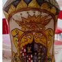 Vaso ad albarello di maiolica anticato con bitume, decorato con smalti in polvere