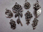 7 Rose diverse metallo color argento  