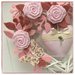Cuore/fiocco nascita in vimini decorato con roselline,farfalle e due cuori sui toni del rosa