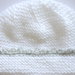 Guanti e cappello completo in lana bianco e filato argento fatto a mano
