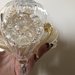 Finale con fiocco, pezzo di ricambio per lampadari di Venini e non, con pezzi rotti o danneggiati, in vetro soffiato, color oro e trasparente 