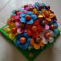 Torta di fiori- chupachups e barrette kinder