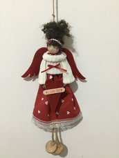 Bambola decorativa con messaggio.