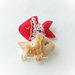 Un pesce rosso con decorazioni oro come bomboniera: una calamita per ricordare il vostro evento