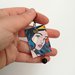 Wonder Woman orecchini di carta pendenti con perla nera