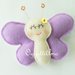 Una farfalla lilla come gadget di compleanno per la tua bambina: una calamita, un portachiavi o una spilla?