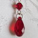 Orecchini color argento al chiacchierino, perline e cristalli rosso rubino