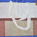 Borsa patchwork in tela beige e rossa