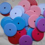 16 dischi di plastica 26 mm.