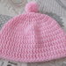 Cappellino neonata, rosa con pon pon