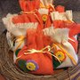 Sacchetto realizzati in tela iuta panna ed arancione