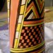 Contenitore cilindrico di ceramica, porta bicchieri di plastica, manufatto con  di greche righe e quadretti