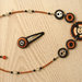 COLLEZIONE STEAMGUM 6 - PARURE collana + clip/fermaglio capelli - argento, arancione e nero