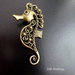 Charm "Cavalluccio marino" color bronzo (50*26*3mm circa) (cod. new)