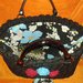 Borsa donna handmade nera realizzata all'uncinetto con della fettuccia lycra cotone idea regalo