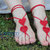 decorazioni artigianali piedi donna con cuore rosso all'uncinetto