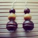 orecchini con perle in legno con tre diverse misure
