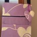Borsetta piatta tracolla tessuto fantasia fiori violetto