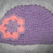 Hand knitted lilac and pink flower hat