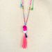 Collana linea Rainbow con frange e pompon