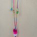 Collana linea Rainbow con frange e pompon