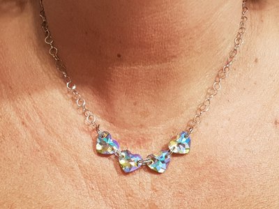 Collana girocollo in acciaio e cuori Swarovski Collana girocollo in acciaio e cuori Swarovski