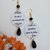 Vasco Rossi orecchini di carta pendenti con ciondolo a cerchio in bianco nero e citazione di una famosa canzone di vasco