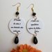 Vasco Rossi orecchini di carta pendenti con ciondolo a cerchio in bianco nero e citazione di una famosa canzone di vasco