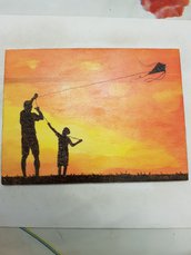 Quadro pirografato e dipinto a mano. Padre e figlio con aquilone al tramonto