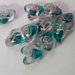 Perla perlina in vetro trasparente a forma di cuore  con dettagli di colore VERDE decorazioni Accessori bigiotteria, orecchini, bracciali, collane
