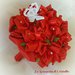 Bouquet di rose di raso rosso laurea
