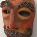Scultura maschera in terracotta