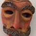 Scultura maschera in terracotta