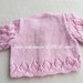 Cardigan / maglia / giacchino /bambina in rosa con fiorellini
