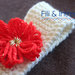 fascia per capelli di lana lavorata a maglia con fiore rosso e dorato