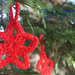 Piccolo addobbo natalizio a forma di stella - chiudipacco - uncinetto