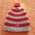 Cappellino bimbi con pon pon realizzato a uncinetto con lana baby pura al 100%