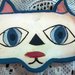 musetto di gatto porta occhiali di ceramica manufatto con 2 occhi, naso e bocca colorati e profilo blu