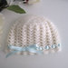 Cappellino neonato neonata uncinetto unisex lana merino color panna fiocco azzurro fatto a mano idea regalo corredino nascita battesimo cerimonia handmade crochet  