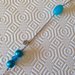 Collana lunga con perle nelle sfumature dell'azzurro fatta a mano