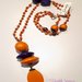 collana stile mala con catena rosario e perle in legno arancione e viola