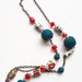 collana con perle in ceramica dipinte a mano e lana cotta