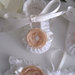 Set scarpine+fascetta capelli bianco/fiore beige neonata uncinetto