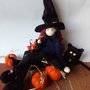 Halloween strega, gatto e zucche