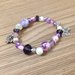 Braccialetto elastico con perle lilla e farfalle fatto a mano