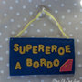 Bimbo a bordo supereroe