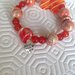 Braccialetto elastico con perle arancioni fatto a mano 