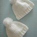 Cappellino neonato con ponpon