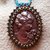 Collana di perline turchesi e bronzo con cammeo 