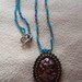 Collana di perline turchesi e bronzo con cammeo 